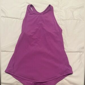 Purple and blue racer back tank tops. Sold separately. Both size 2.